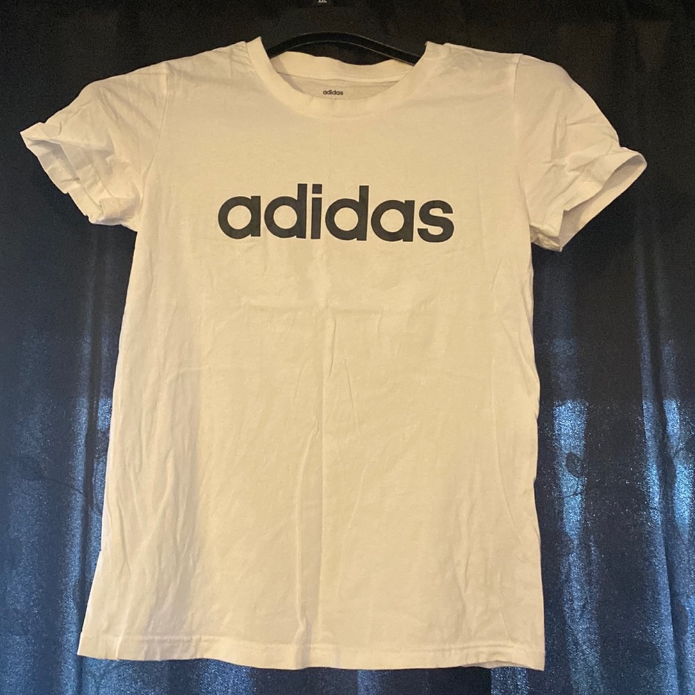 Adidas woman’s shorts sleeves medium shirt.